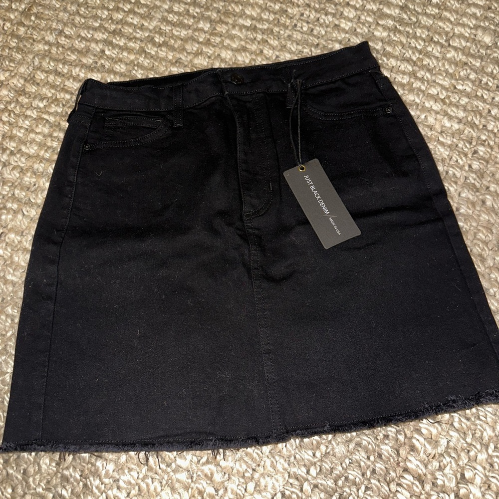 Brand new with tags. Black denim stretch mini skirt